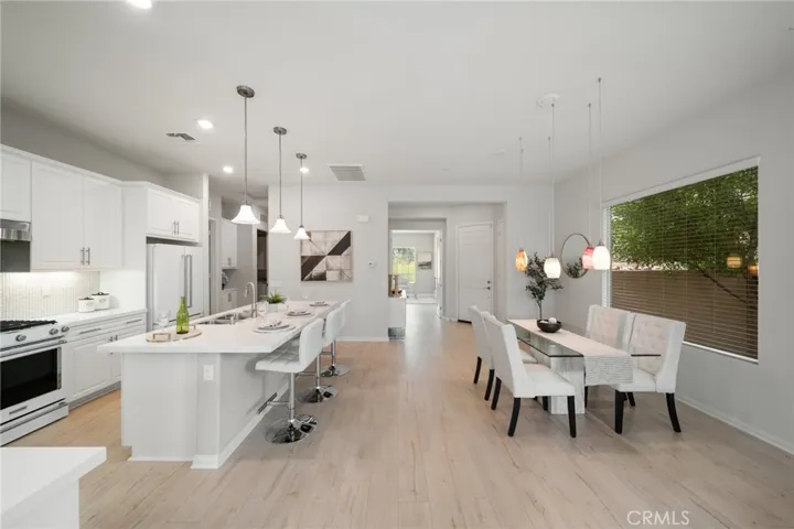 Kitchen and Dining Area with Entry View