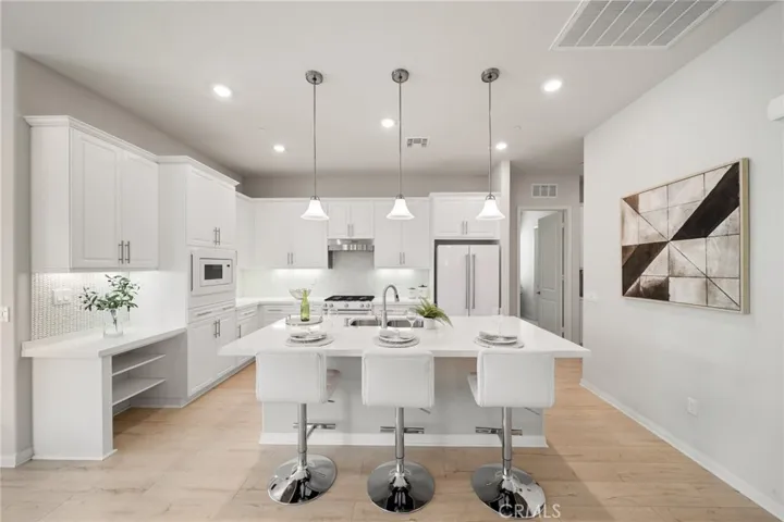 Kitchen with Center Island and Bar Seating