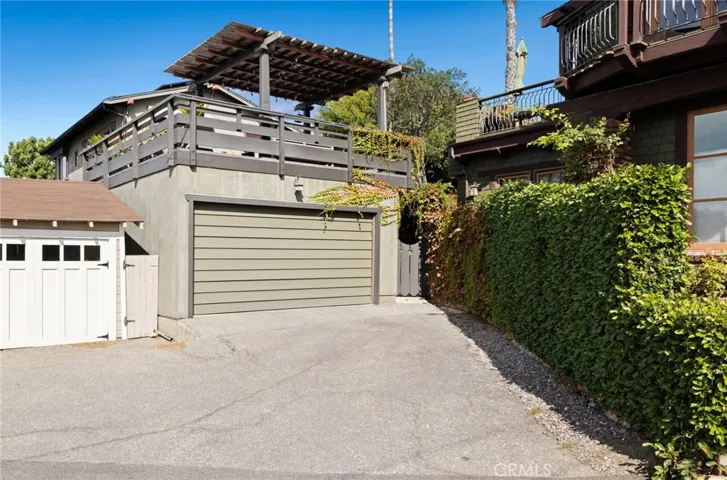 Enjoy the rare rewards of a private street-to-street lot with generous off-street parking and a two-car​​‌​​​​‌​​‌‌​​‌​​​‌‌​​​‌​​‌‌​​‌‌​​‌‌​​​​ garage.