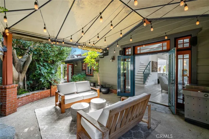 A private covered lanai with a tranquil garden off the living room.