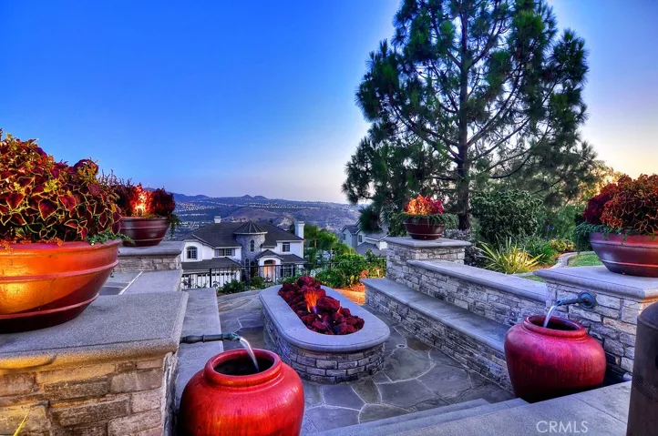 Sunken firepit with 2 potted foutains