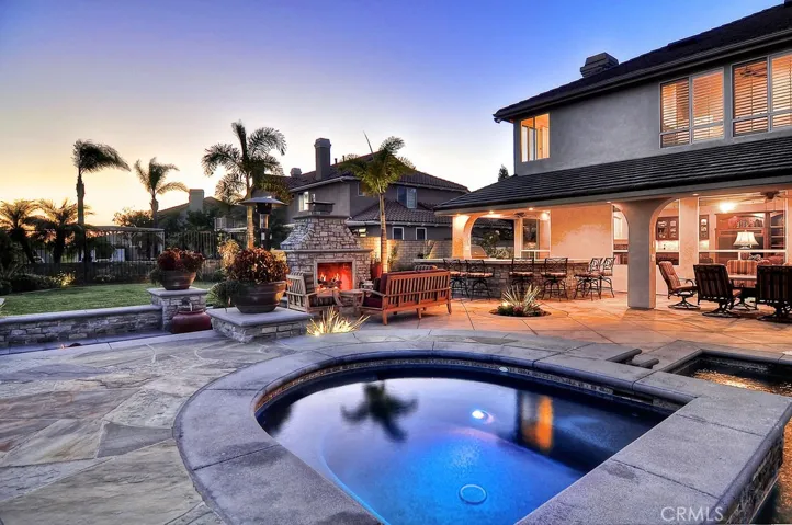 Outdoor Fireplace and oversized wrap around bar
