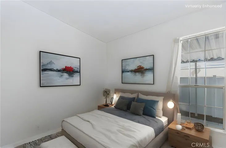 Virtually staged guest bedroom.