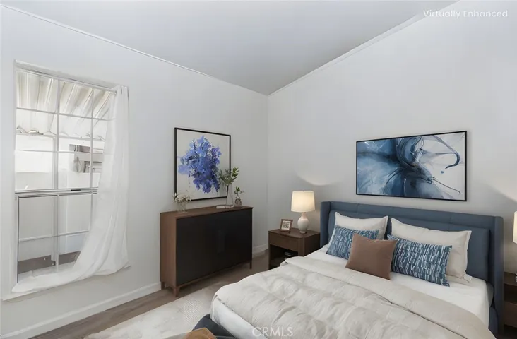 Virtually staged guest bedroom.