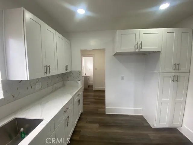 Kitchen and entry to laundry and half bath