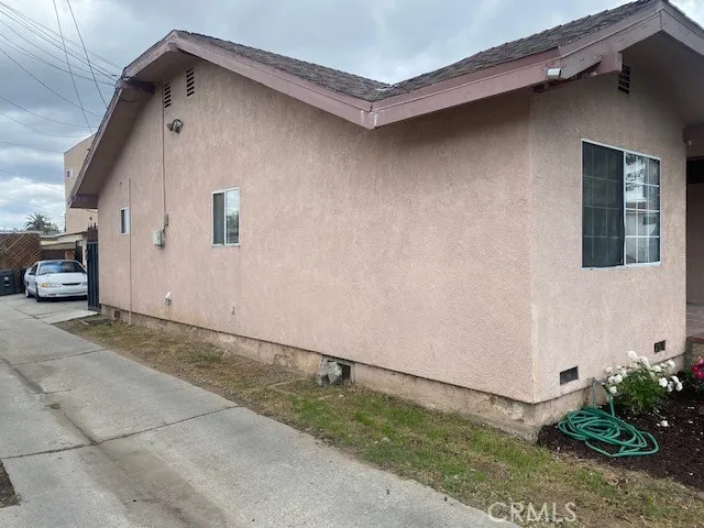 Side access to garages and rear unit