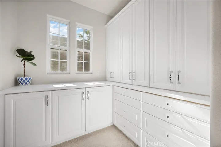 Primary Bedroom closet entry with ample storage