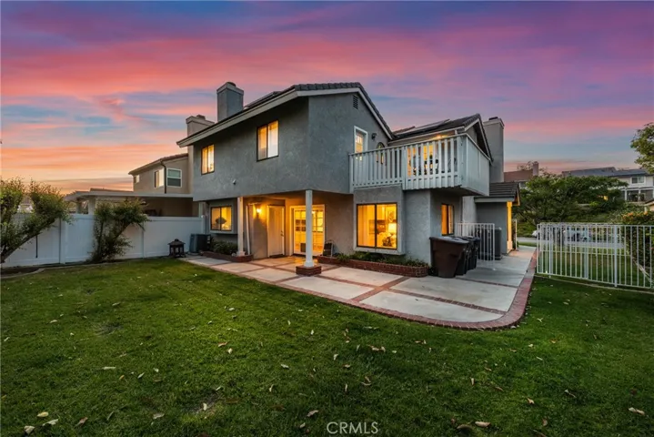 Game room and attached ADU (2 windows upstairs) are at back of home.