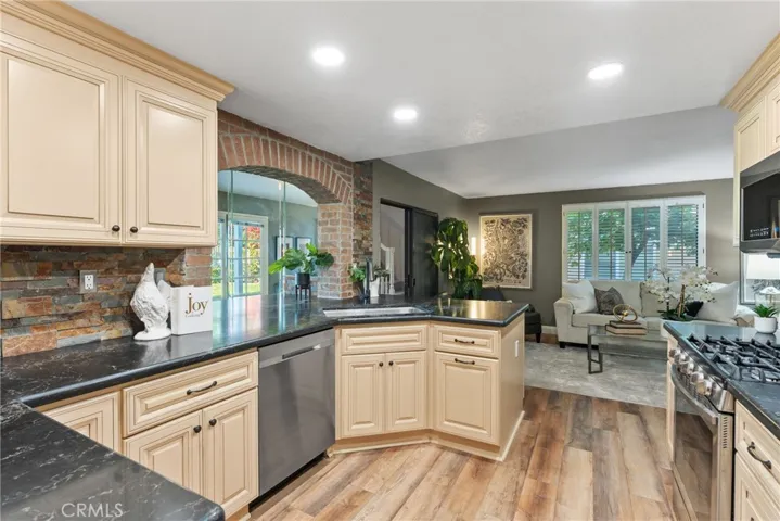 Kitchen was remodeled 4 yrs ago per Seller. Samsung appliances. Open to TV room and game room addition.