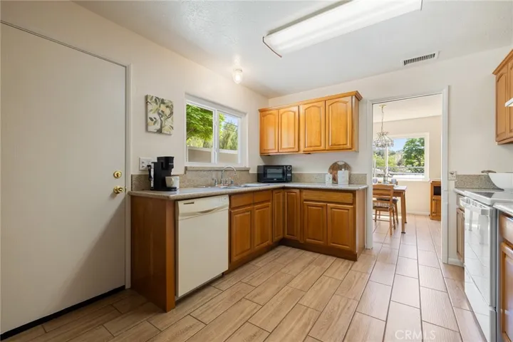 Kitchen. Left door: Access to the backyard