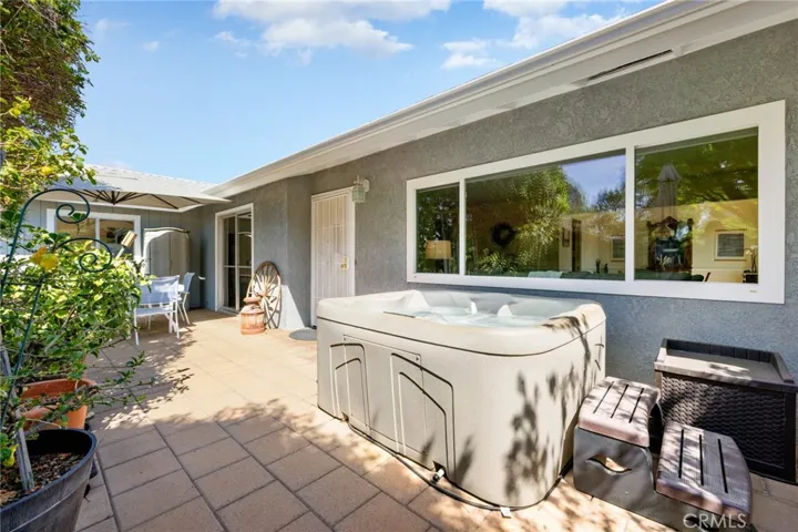 Front patio with above ground spa