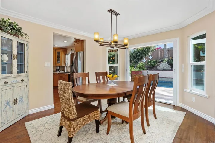 Dining room with French doors leading out to back patio and yard.