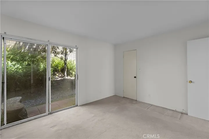 Bedroom #2 with patio area