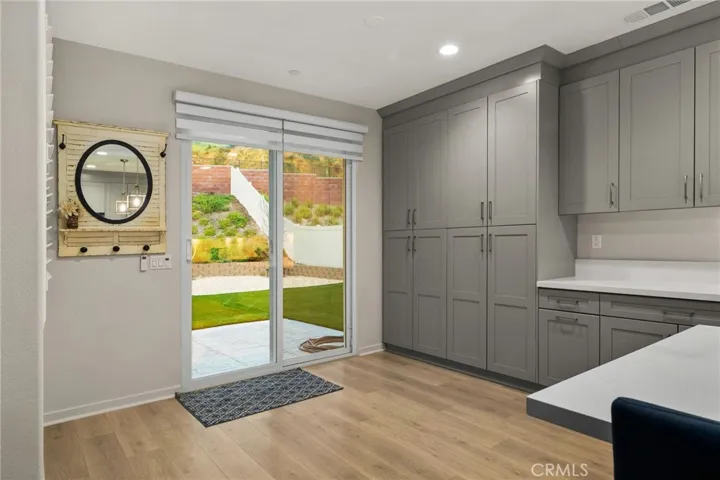 Kitchen storage and slider to back yard