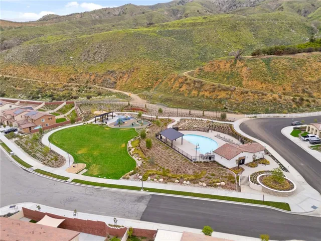 Community pool, clubhouse and playground park amenities.