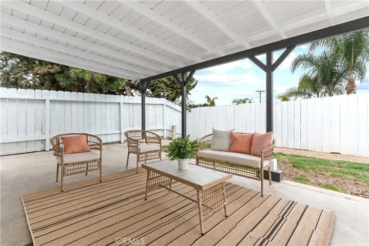 Covered backyard patio.
