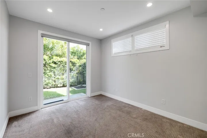 3rd bedroom with backyard access