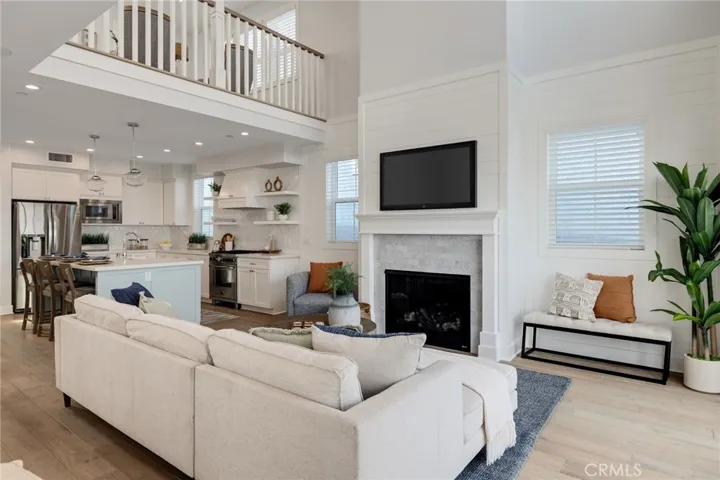 living room with two story ceilings