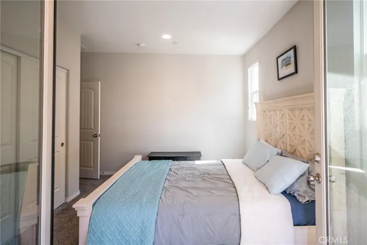 Bedroom Upstairs with French Doors to the private Balcony
