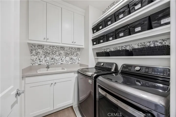Second Floor Laundry Room with Utility Sink