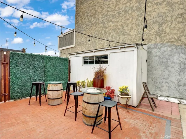 Backyard seating and storage shed