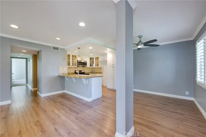 View from Living room toward hallway to bath and bedrooms