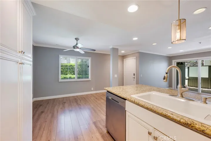 Kitchen opens to dining room