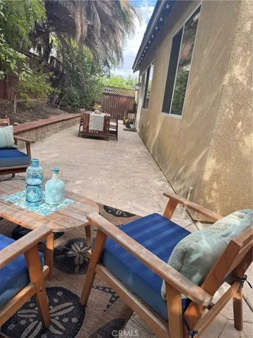 The backyard is low maintenance with designer concrete cement throughout backyard. 
