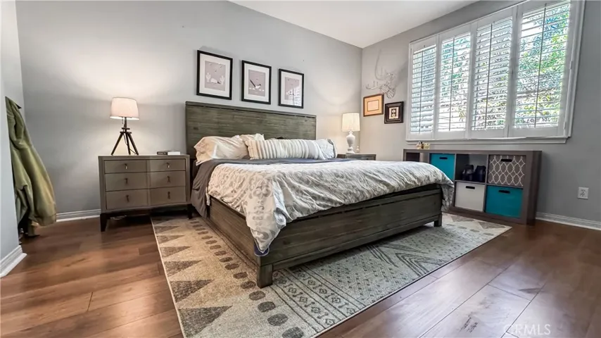 Bedroom #2 is the  "Master Bedroom"  located on first floor with view of backyard. An added feature it has a ceiling fan.