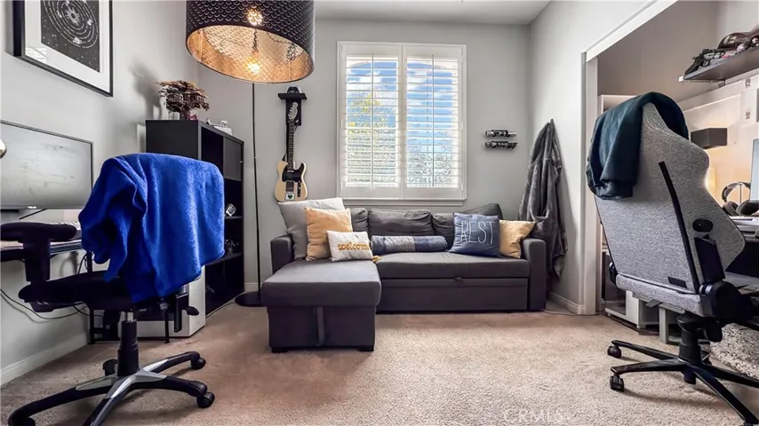 Bedroom #1 currently being used as an office located on first floor. It has view of front yard and closet door will be put back on at close of escrow.