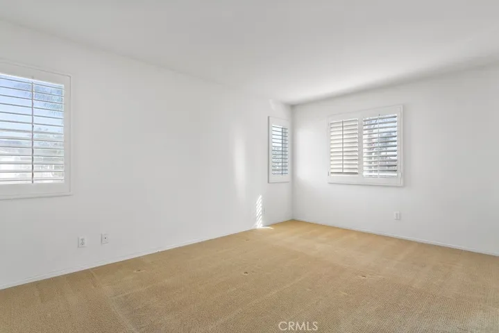 Primary bedroom with upgraded carpet