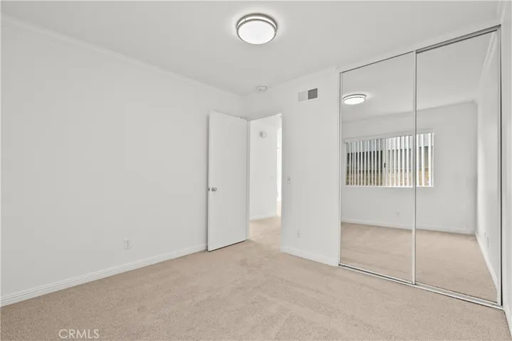 Secondary Bedroom w/Mirrored Wardrobes