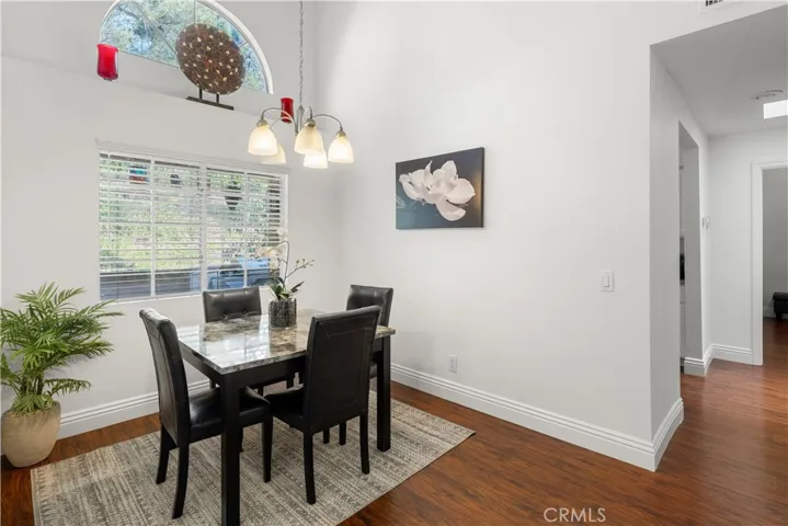 Dining Room Over Looking Patio and View of Outside