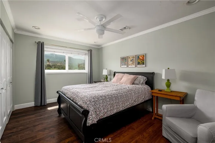 Secondary bedroom with view of the mountains.