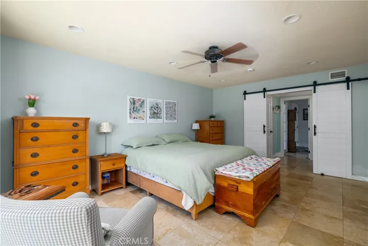 Another view of the primary bedroom.