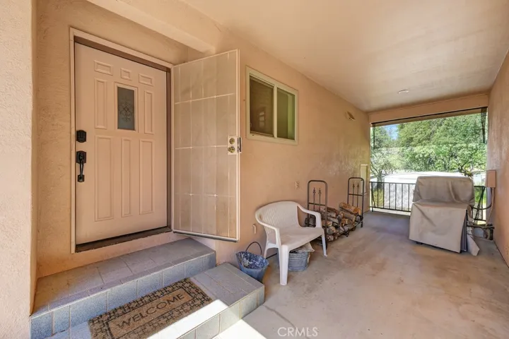 Main level entrance under covered breezeway