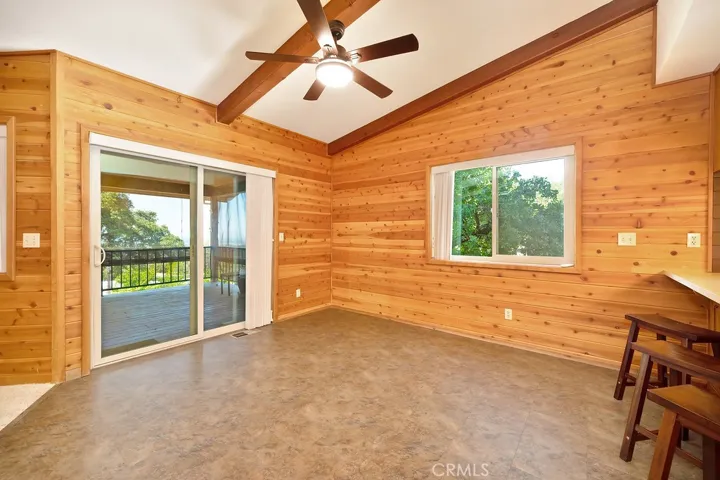 Dining room with sliding door out to large covered deck with amazing views.