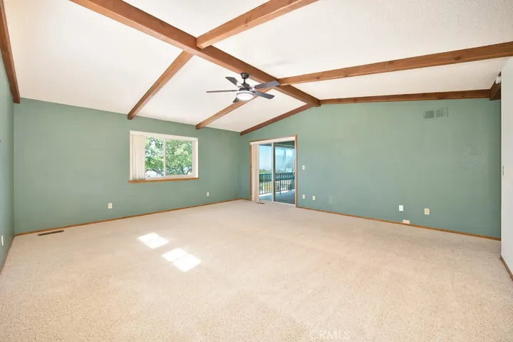Separate sliding door out to large covered deck