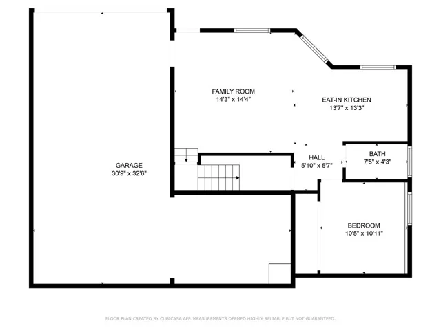 Downstairs floor plan with large garage and workshop area