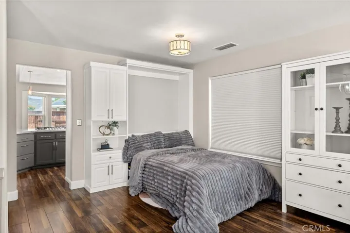 Murphy bed down with bed open.