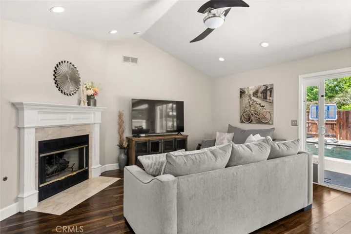Back living room with view of pool.