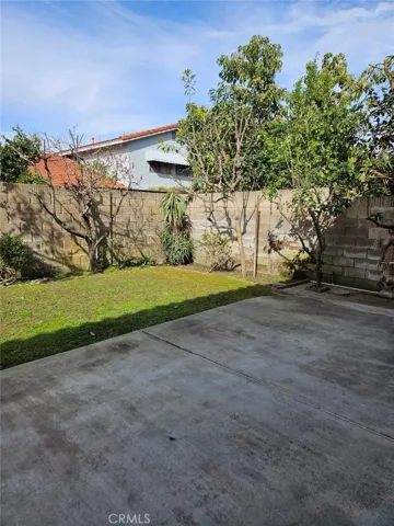 Spacious Backyard with beautiful Landscaping and a variety of Fruit Trees