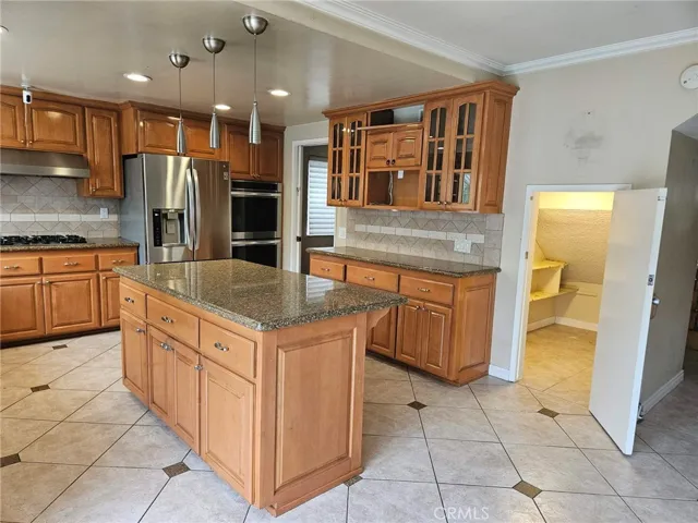 Another View of the Kitchen showcasing the large Walk-In Pantry