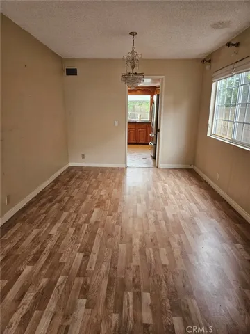 View From the Living Room into the Dining Room and Through to the Kitchen