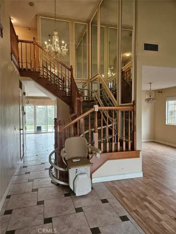 Elegant Spiral Staircase with a High End Chair Lift