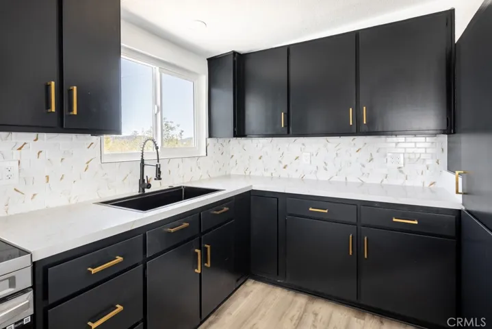 KITCHEN WITH CUSTOM BACK SPLASH
