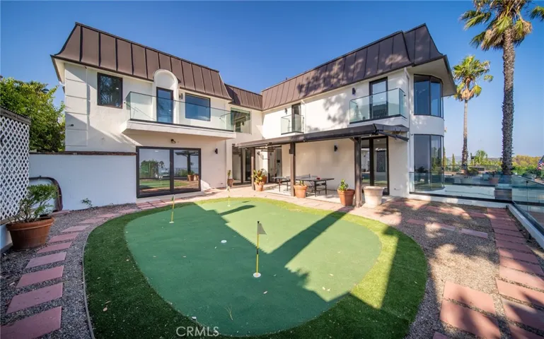 Putting green and driving net