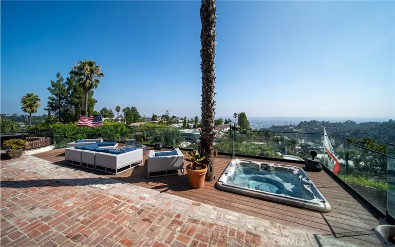 Lounge chairs & Sunken hot tub on the deck
