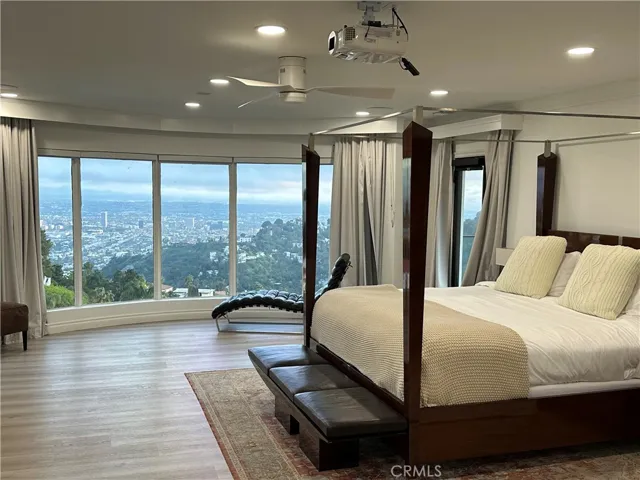 Luxurious Primary Bedroom with space, storage and views from downtown to the ocean