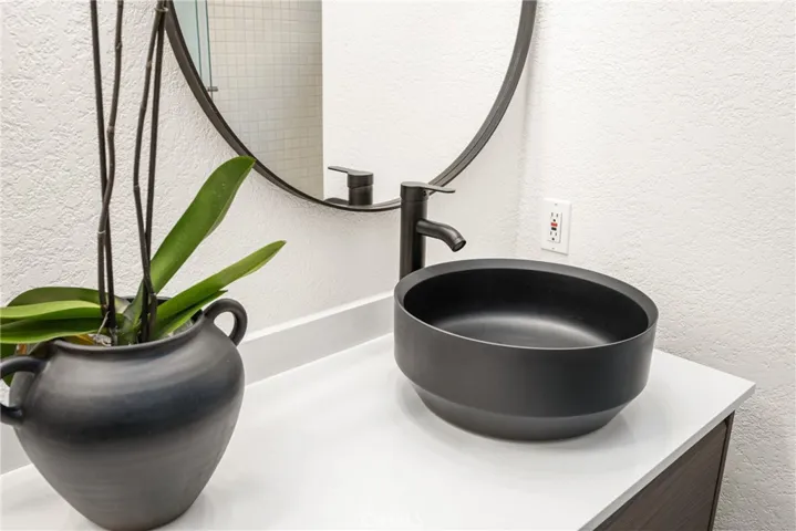 with sleek pedestal sinks